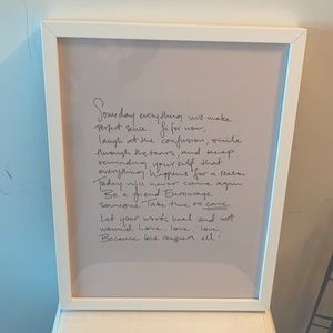 Printed art in white frame